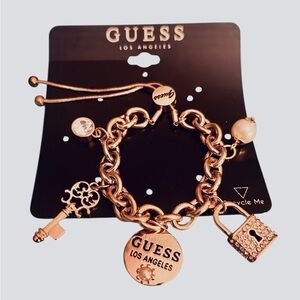 Guess Gold Chain Bracelet with Charms with Toggle Closure